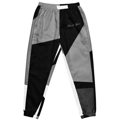 Bas de survêtement grisThe unisex track pants are your new go-to piece for working out or styling a streetwear outfit. The water-resistant, lightweight fabric and mesh lining provide comfo